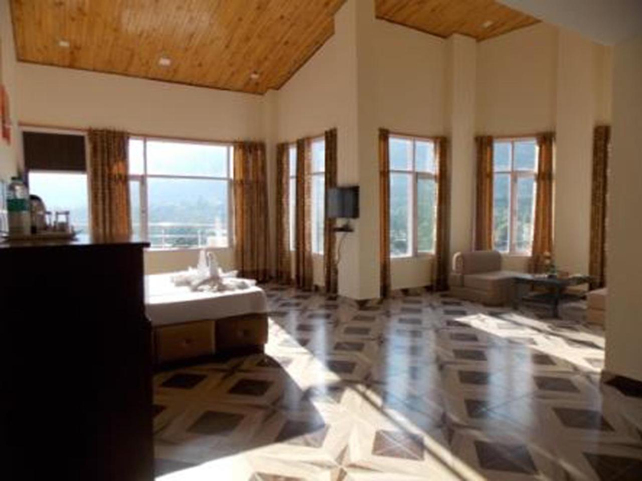 Adb Rooms Snow Touch Resort Manāli Exteriör bild